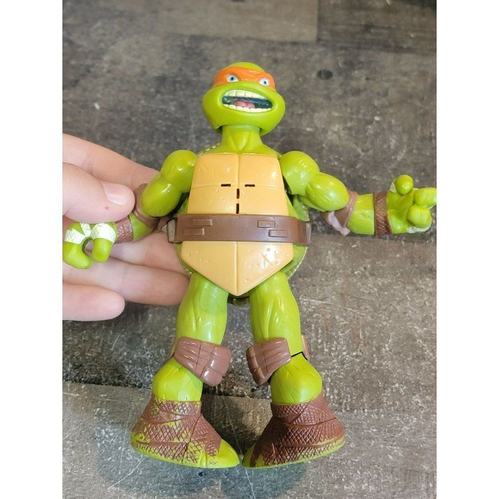 Viacom 2012 Teenage Mutant Ninja Turtles Michelangelo orange toy figure